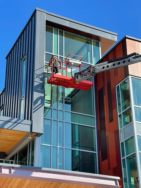 Commercial window cleaning crew cleaning office building windows in Hamilton, Ontario