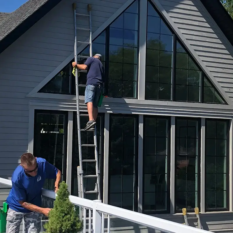 Window cleaning team working safely in Hamilton weather conditions